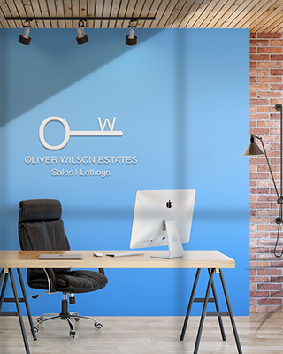 Image of an office backdrop featuring artwork designed by Seaweed & Spruce.
