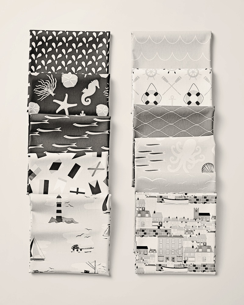 Black and white image of fabric swatches featuring designs from the Quayside Collection.